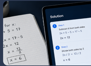 Notebook with a handwritten algebra problem next to a tablet showing a step-by-step solution